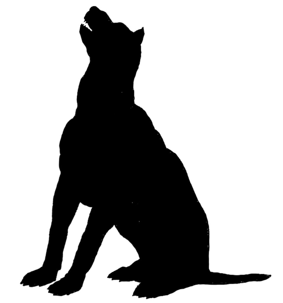 A seated dog barking.