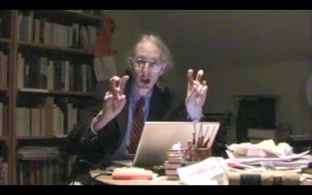 Screen grab from the video showing Dan at his desk.