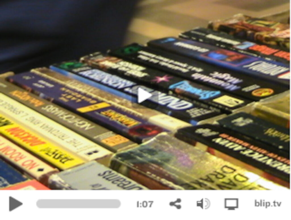 Screen grab from the video showing a table with books for sale.